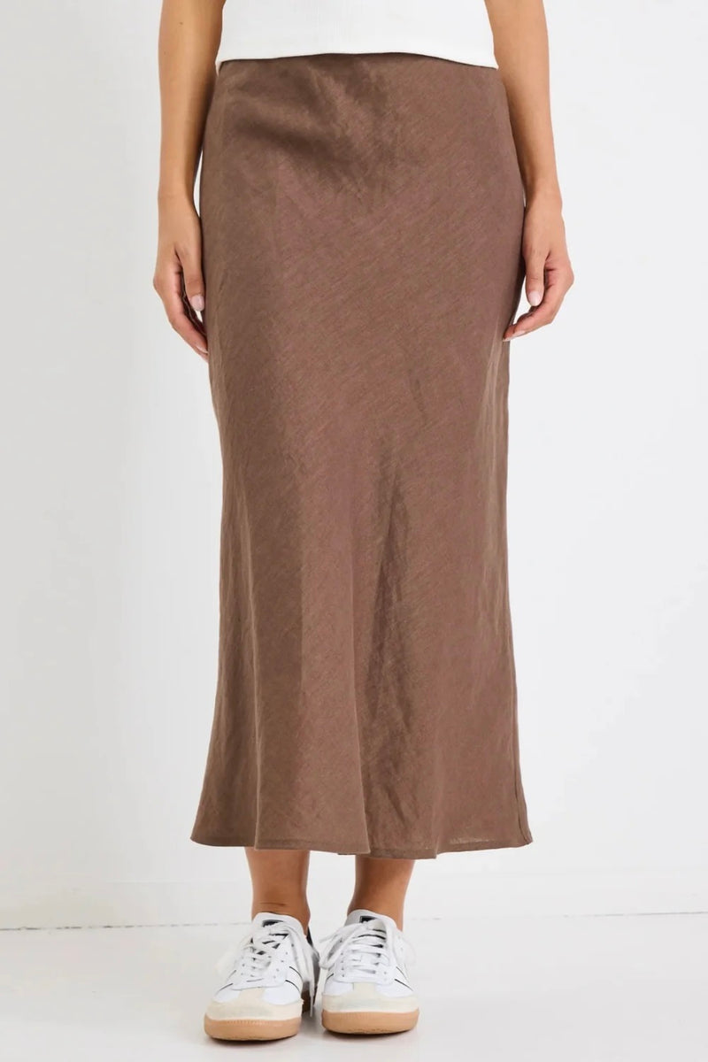Effortless elegance in chocolate tones – the Bliss Linen Bias Midi Skirt by Re:Union Label.