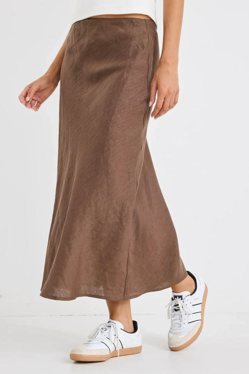 Effortless elegance in chocolate tones – the Bliss Linen Bias Midi Skirt by Re:Union Label.
