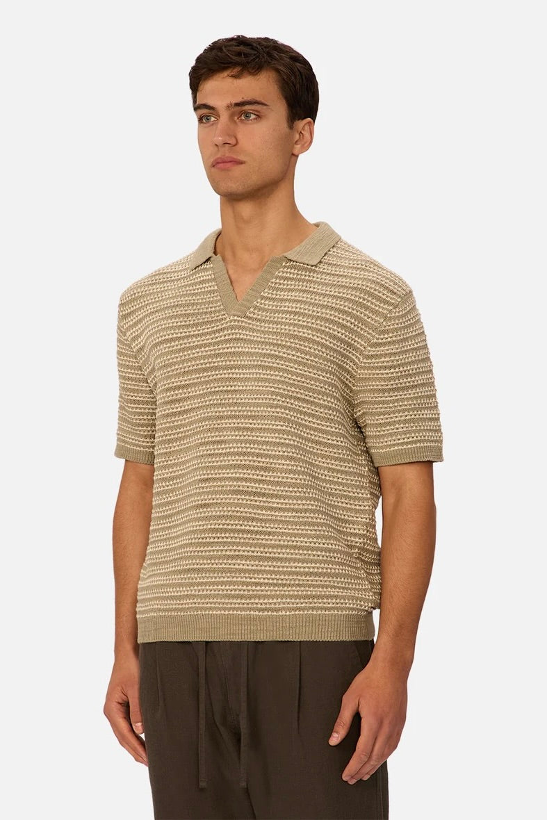 Front view of The Matera Polo – Olive/Stone by Industrie showing contrast collar and button neckline.
