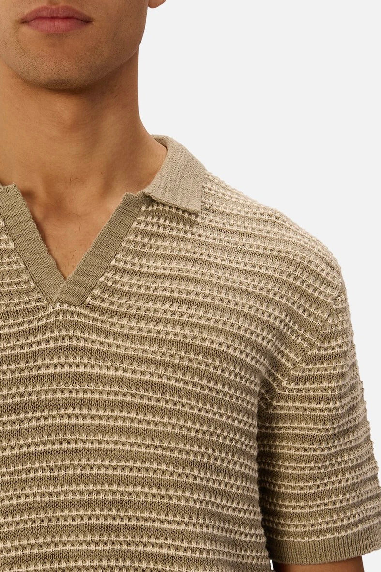 Front view of The Matera Polo – Olive/Stone by Industrie showing contrast collar and button neckline.