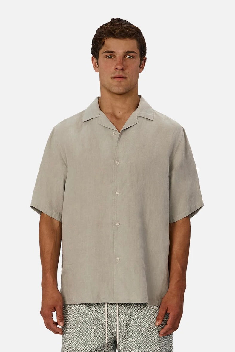 Front view of The St Martins Short Sleeve Linen Shirt – Spruce by Industrie showing button-up design and short sleeves.