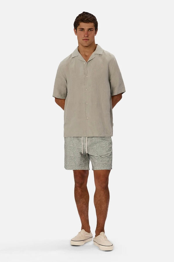 Front view of The St Martins Short Sleeve Linen Shirt – Spruce by Industrie showing button-up design and short sleeves.