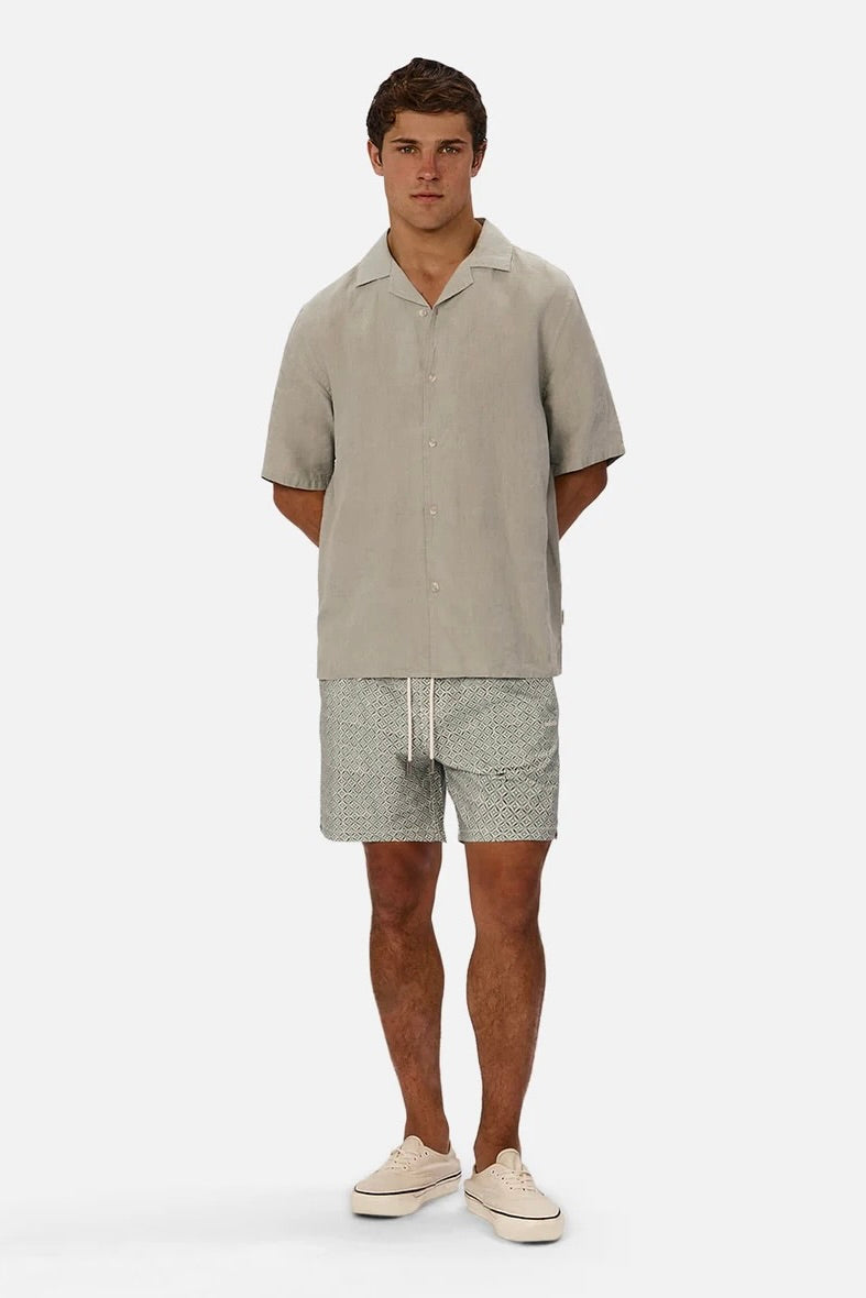 Front view of The St Martins Short Sleeve Linen Shirt – Spruce by Industrie showing button-up design and short sleeves.