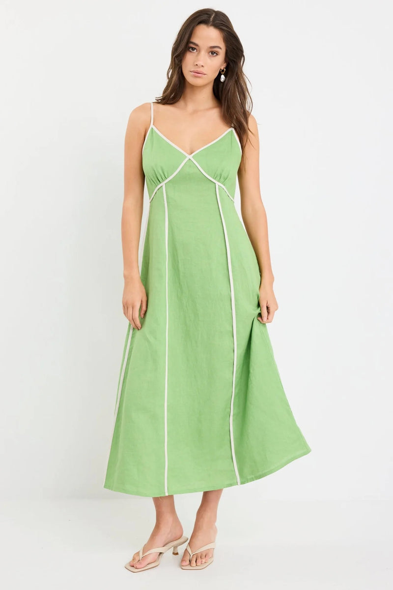 Front view of Marine Apple Contrast Piped Linen Strappy Maxi Dress by Among The Brave showing contrast piping and adjustable straps.