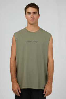 Model wearing Silent Theory Legacy Muscle in olive, featuring sleeveless design and relaxed fit.