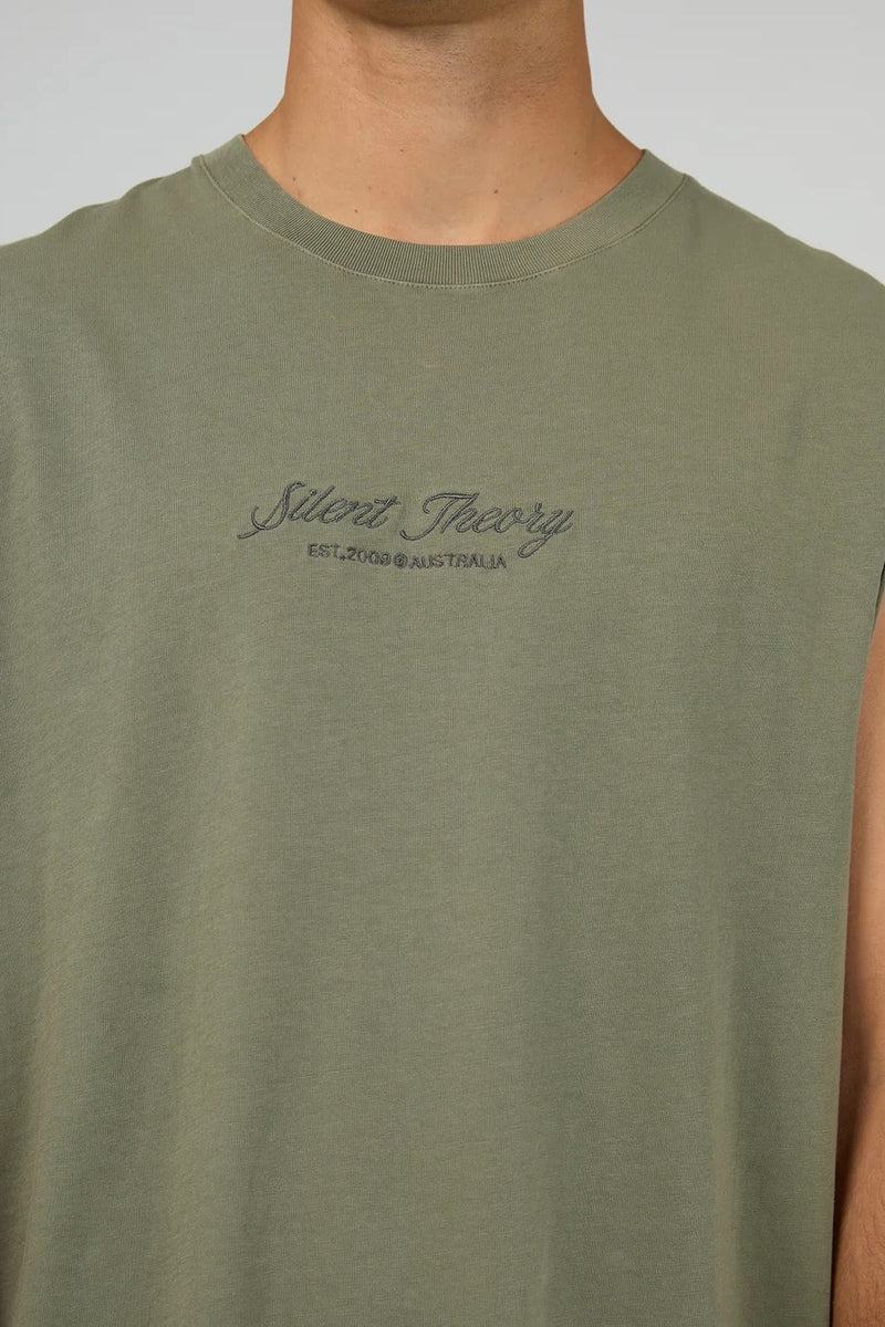 Model wearing Silent Theory Legacy Muscle in olive, featuring sleeveless design and relaxed fit.
