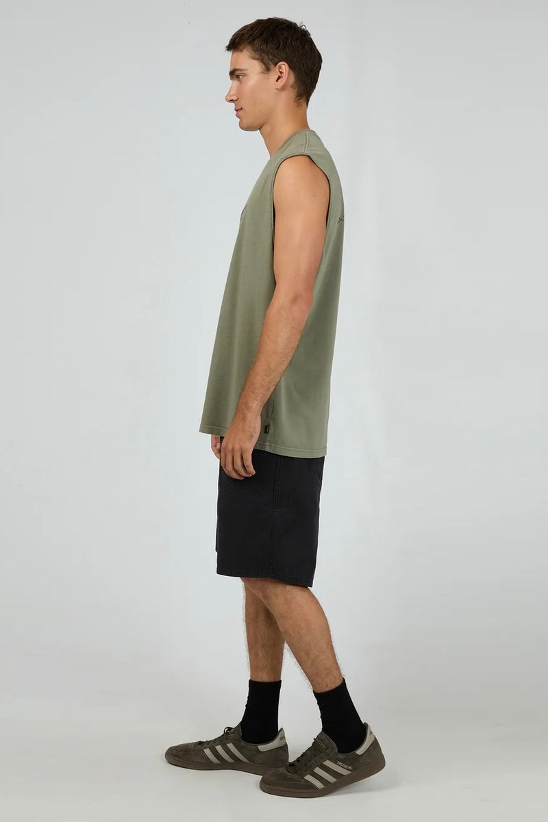 Model wearing Silent Theory Legacy Muscle in olive, featuring sleeveless design and relaxed fit.