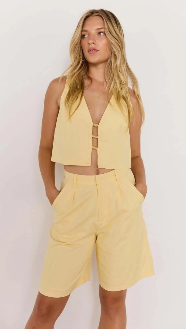 Minkpink Gigi butter yellow linen high-waist Bermuda short, tailored linen shorts women, chic summer outfit, butter yellow linen co-ord set, minimal resort wear clothing