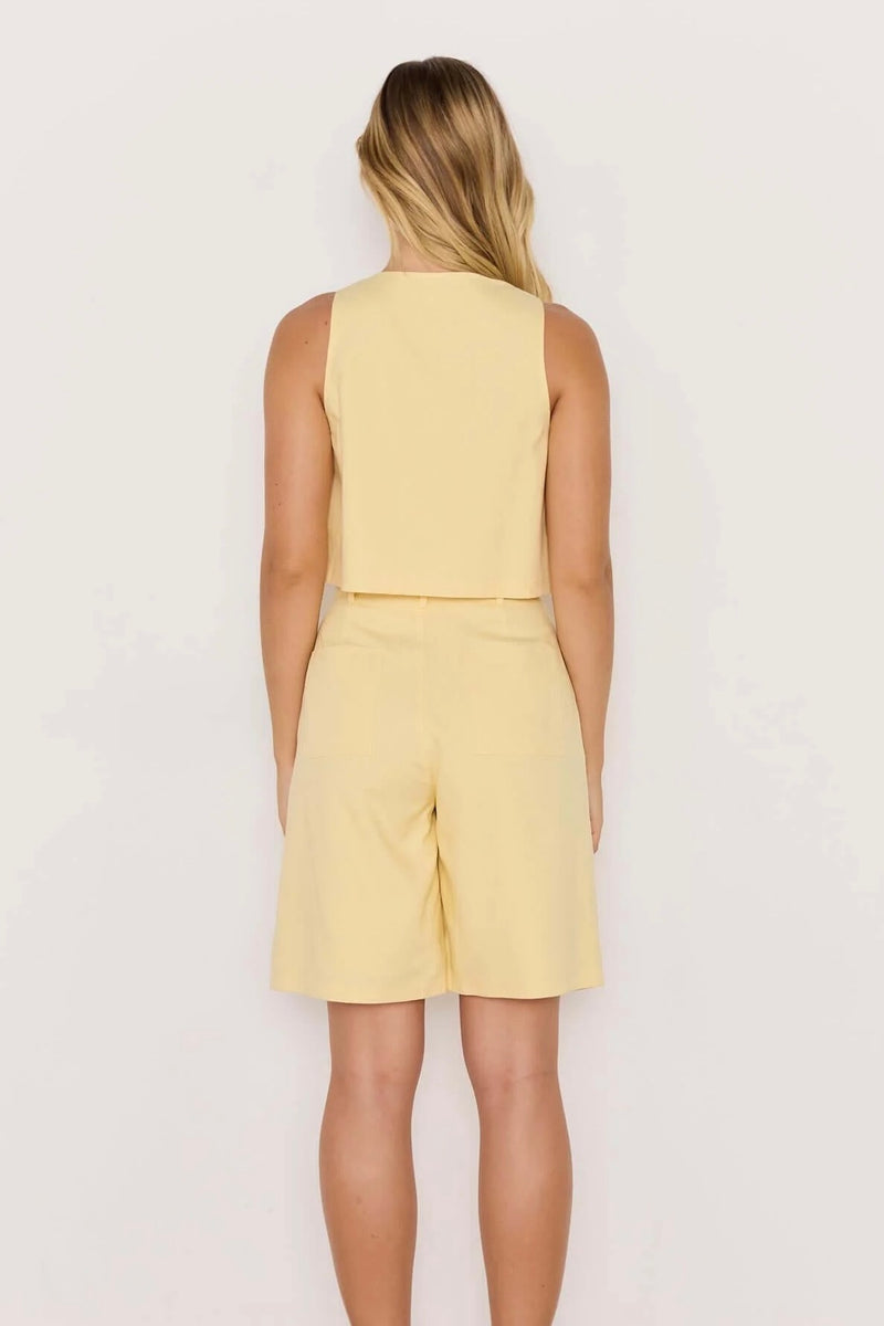 Minkpink Gigi butter yellow linen high-waist Bermuda short, tailored linen shorts women, chic summer outfit, butter yellow linen co-ord set, minimal resort wear clothing