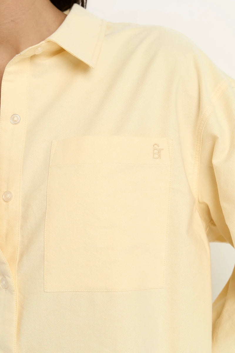 Effortless, oversized, and a pop of lemon – the ultimate boyfriend shirt by Stories Be Told